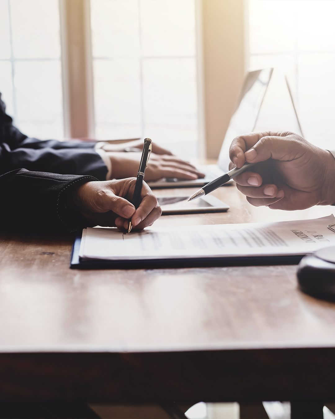 An attorney and client reviewing a case