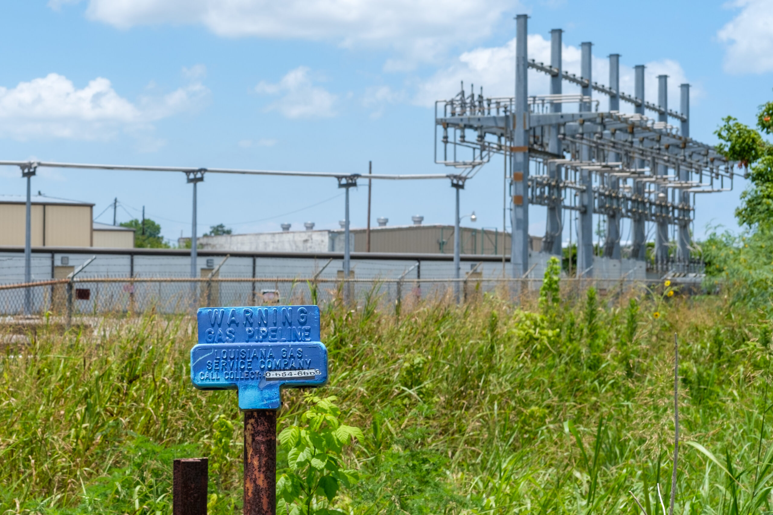 Closeup of gas Pipeline Warning Sign for Louisiana Gas Service Company on June 12, 2023 in Jefferson, Louisiana, USA