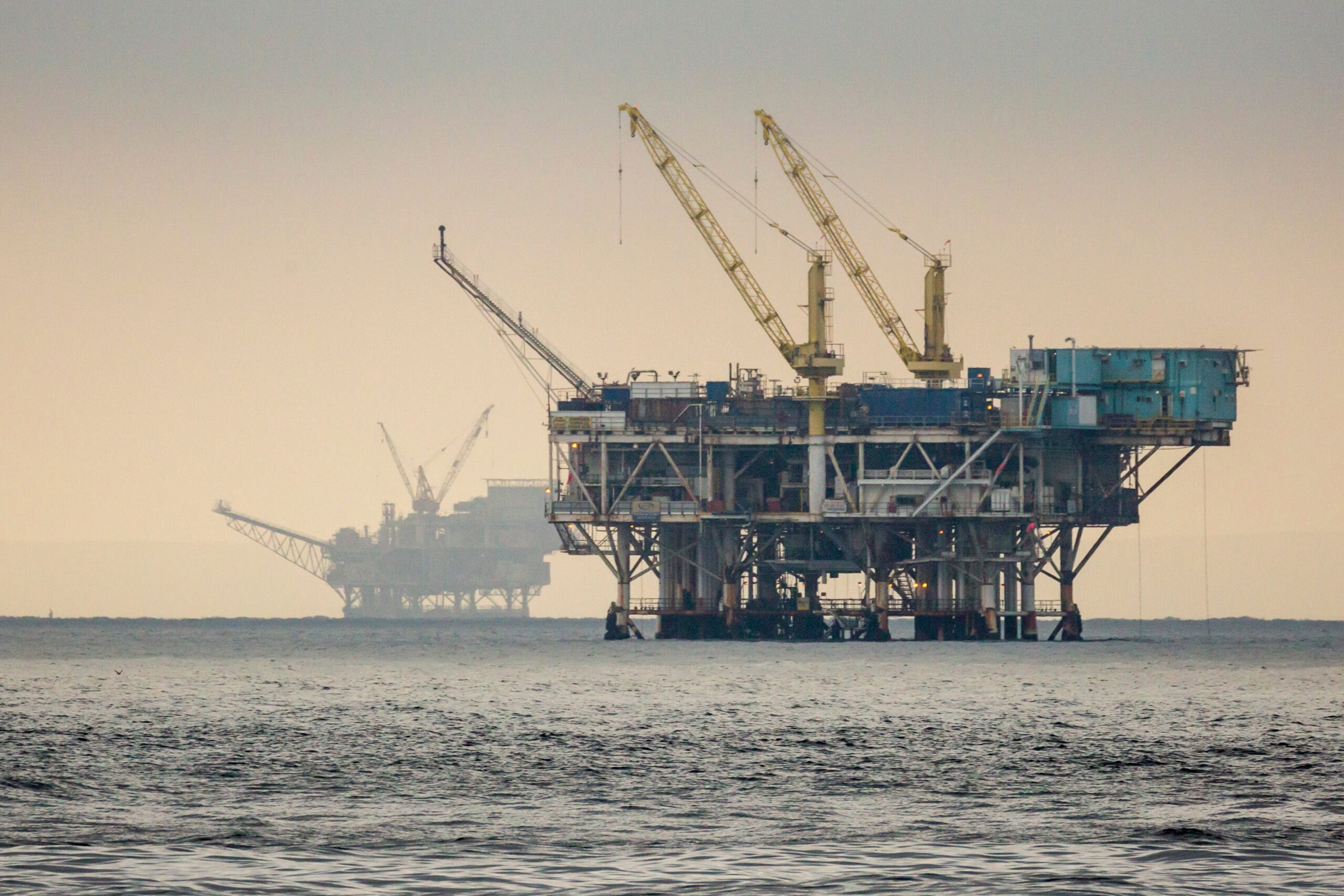 A pair of offshore oil rigs off the coast