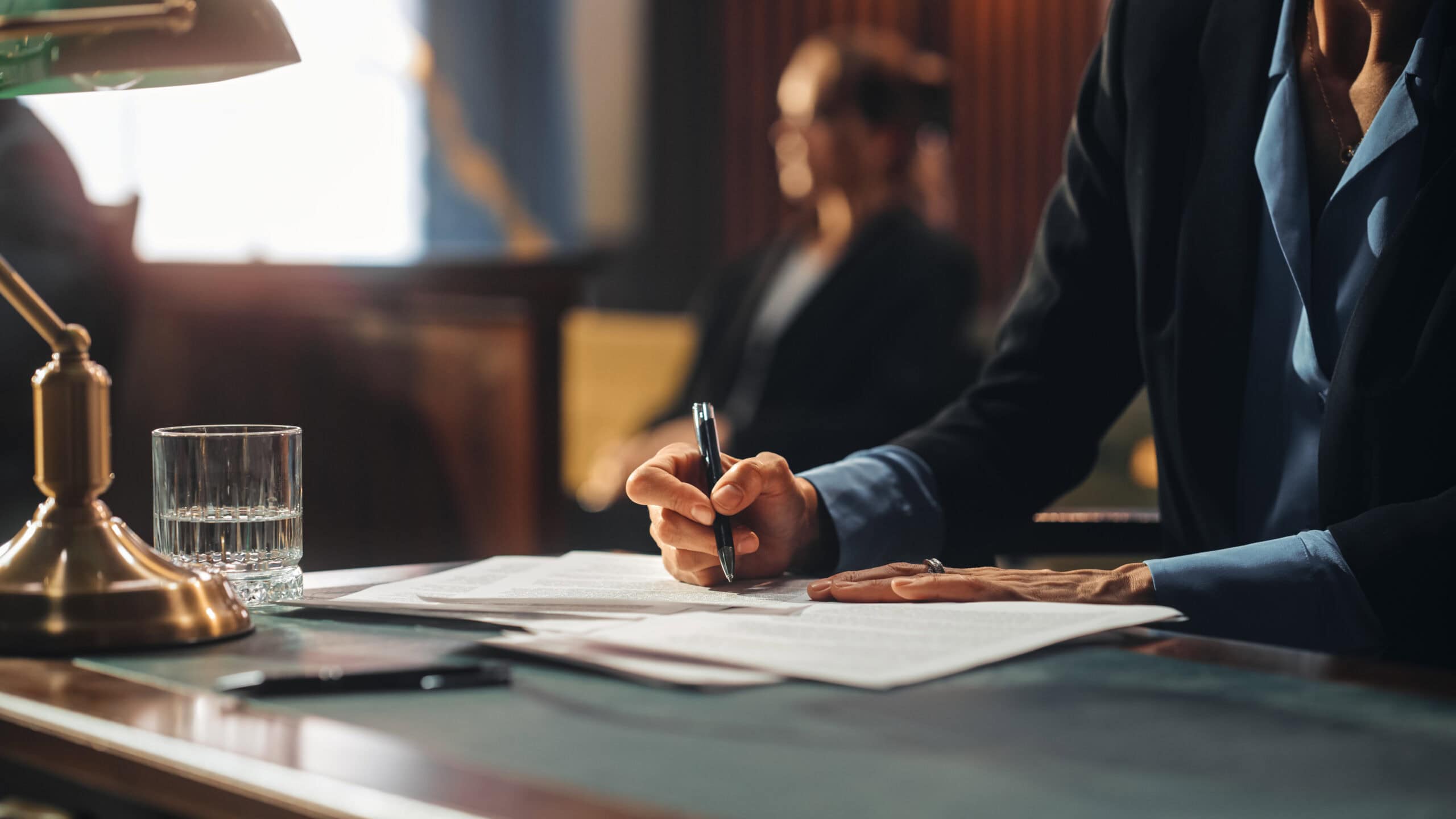 Female Public Defender Writes Down Arguments for Defence Strategy. Successful Attorney Lawyer Fight for Freedom of Her Client with Supporting Evidence. Close Up.