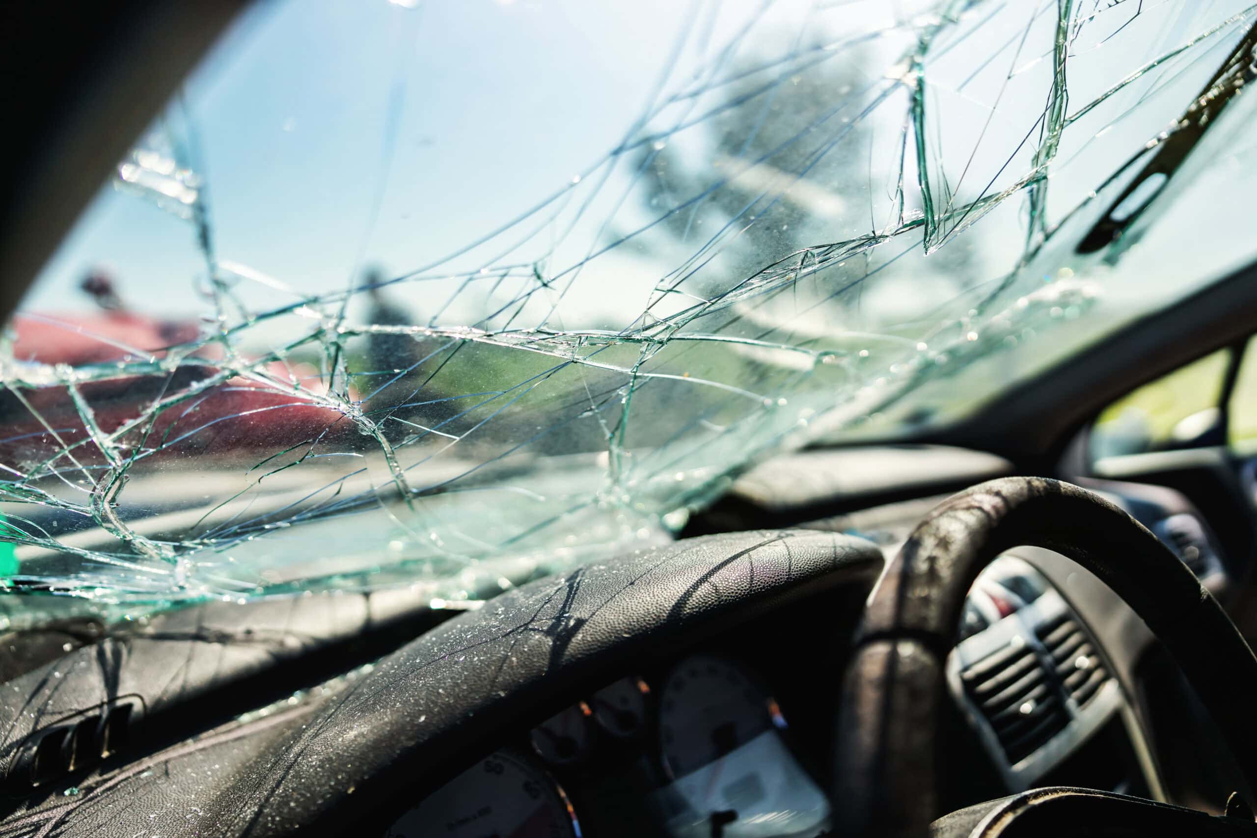 Closeup of crashed car window in car accident