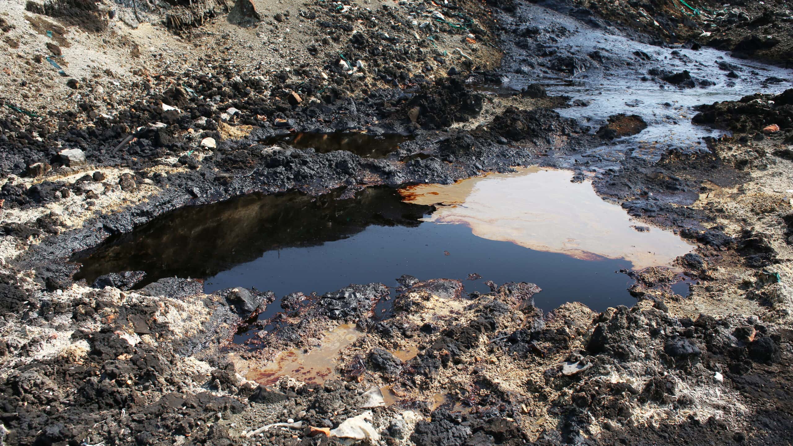 Former dump toxic waste, oil lagoon contamination.