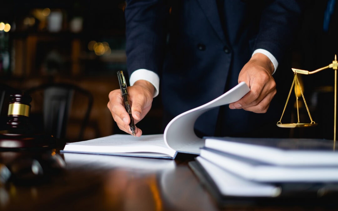 Close up lawyer working on a document