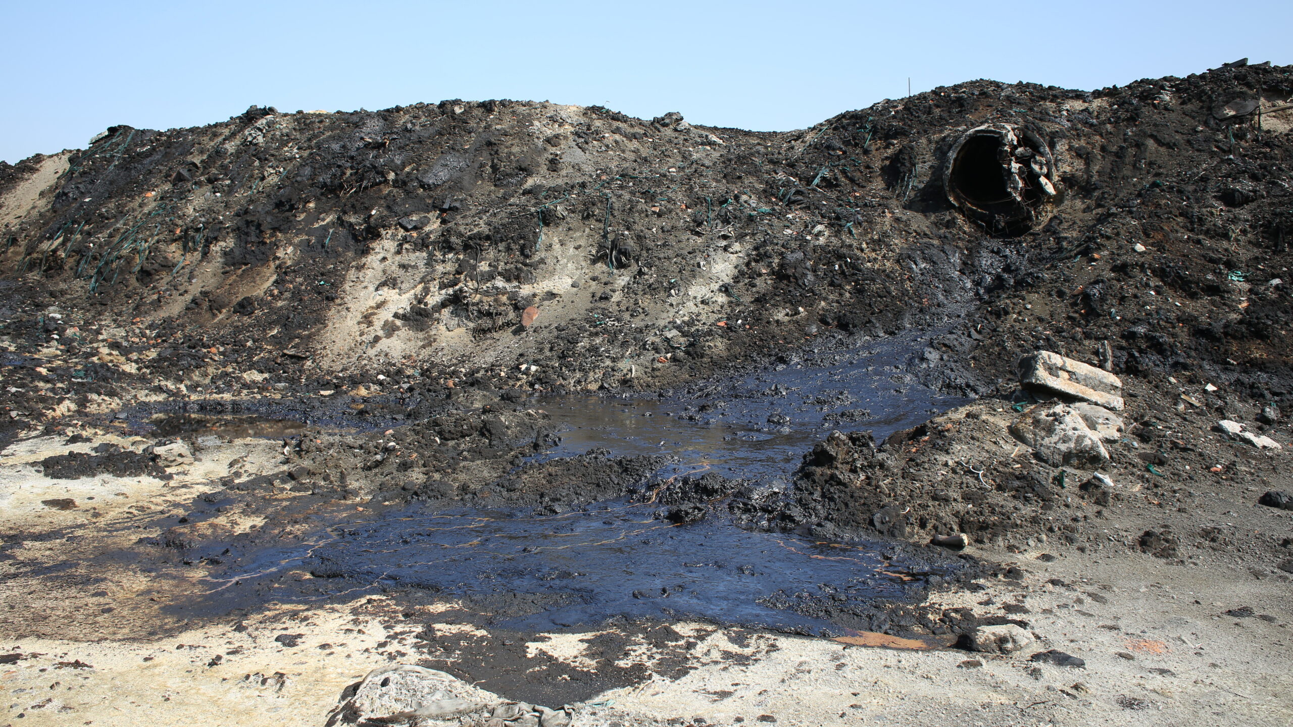 Former dump toxic waste, oil lagoon contamination.