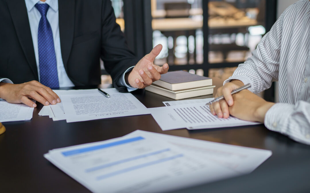 Lawyer Legal counsel presents to the client a signed contract